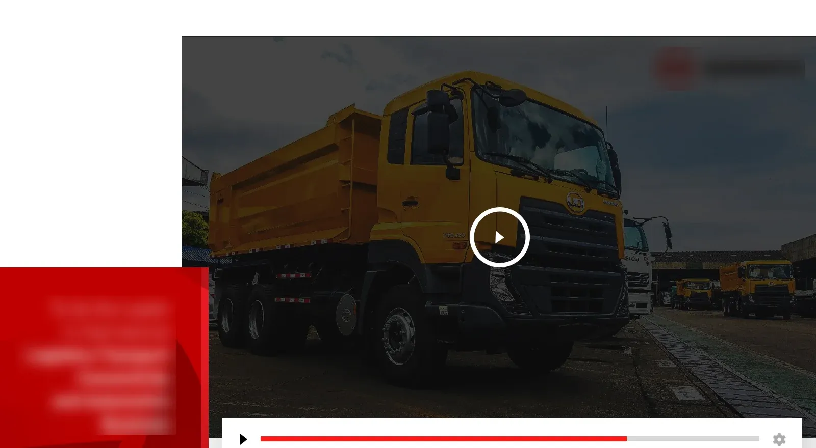 A video player framing a yellow dump truck beside a red text panel